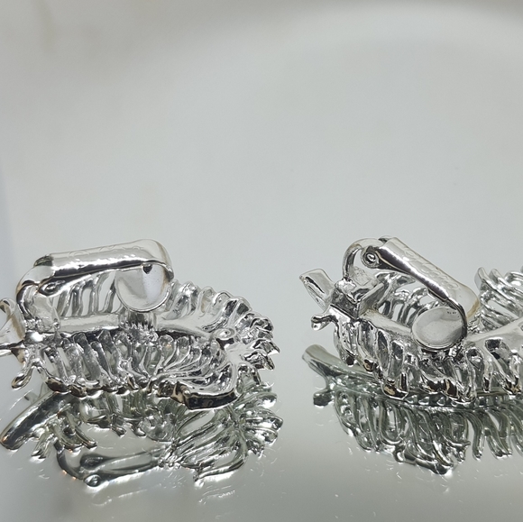 Silver Coro Feather Clip-on Earrings - Picture 3 of 3